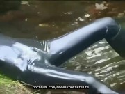 Outdoor walk in the wood and river bath full encased in black latex catsuit and rubber gas mask 14/16