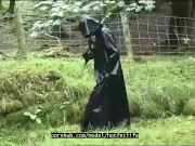 Outdoor walk in the wood and river bath full encased in black latex catsuit and rubber gas mask 2/16