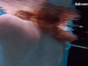 Floating in the swimming pool naked Anetta 16/16