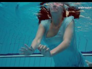 Swimming and stripping teen Piyavka in the pool