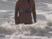 My wife, a Latin mother, exhibits herself on the beach and masturbates in front of the hotel owner, 3/16