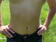 Alice sunbathing topless on a public beach, playing with tits and a toy, and pissing 7/16