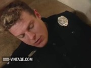 Sarah Young helped out by two horny cops in a vintage threesome 15/16