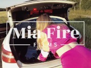 Fitness girl Mia Fire fucked in the field by the car 1/16