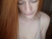 redhead girl smokes a cigarette 1/16