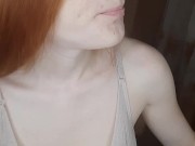 redhead girl smokes a cigarette 14/16