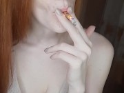 redhead girl smokes a cigarette 16/16