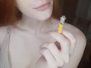 redhead girl smokes a cigarette 8/16