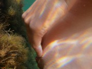 Slim girl swims naked in sea and masturbate her pussy 5/16