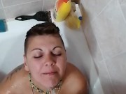 Pissing on girlfriend while she was sitting a bathtub 9/16