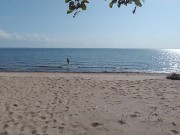 what the hell is he doing? caught a hottie on a public beach 1/16