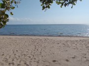 what the hell is he doing? caught a hottie on a public beach 3/16