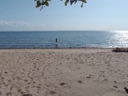 what the hell is he doing? caught a hottie on a public beach 7/16
