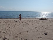 what the hell is he doing? caught a hottie on a public beach 8/16