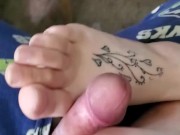 WifeStrokingMyCockWithHerFeet