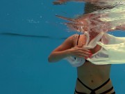 Russian pornstar Anastasia Ocean strips in the pool 13/16