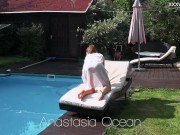 Russian pornstar Anastasia Ocean strips in the pool 2/16