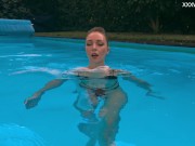 Russian pornstar Anastasia Ocean strips in the pool 9/16