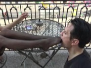 Teen Princess Kirstin shows her foot slave to the general public on the balcony. 14/16