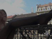 Teen Princess Kirstin shows her foot slave to the general public on the balcony. 9/16