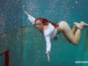Russian teen Lola gets horny in the swimming pool 12/16