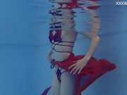 Marfa is cute shy Russian pornstar who gets naked in the pool 14/16