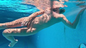 Russian pornstar hot babe Mary Kalisy strips underwater