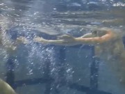 Teens and solo teen babe swimming underwater in pool 14/16