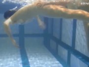 Teens and solo teen babe swimming underwater in pool 15/16