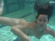 Babes swim strip and have fun underwater