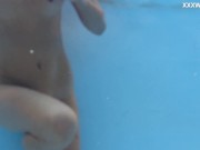 Russian pornstar Emily Ross swims and strips for you 16/16