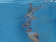 Russian pornstar Emily Ross swims and strips for you 7/16