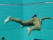 Hottest tattooed Hungarian teen Zlata swims in the pool 9/16