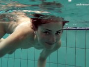 Russian girl swims nude while stripping in the pool 9/16