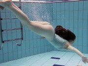 Horny Czech babe Salaka swims nude in the Czech pool 1/16