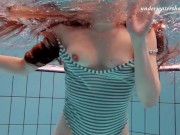 Horny Czech babe Salaka swims nude in the Czech pool 8/16