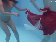 Big tits and small tits Russian pornstars in the pool 7/16
