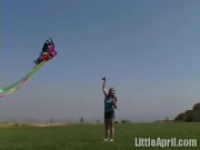 Teen rubbing outdoors 1/16