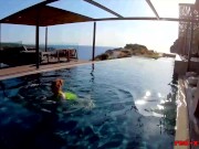 Busty redhead wife masturbates while outside in the pool 1/16