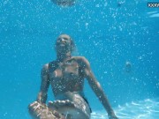 Beautiful blonde Zazie Skymm swims nude 12/16