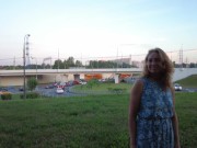 A couple, in plain sight, engaged in extreme sex in a clearing near the road 1/16