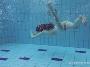 Floating babe in the warm pool getting naked 15/16