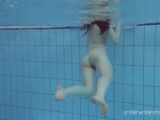 Floating babe in the warm pool getting naked 16/16