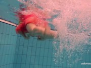 Hungarian babe Dona enjoys being naked in the pool 4/16