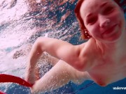 Red long dress and big tits floating in the pool 13/16
