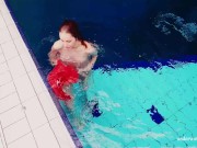 Red long dress and big tits floating in the pool 15/16