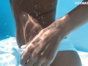 Swimming pool nudist action by sexy euro babe Candee 16/16