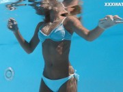 Swimming pool nudist action by sexy euro babe Candee 8/16