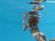 Swimming pool nudist action by sexy euro babe Candee 9/16