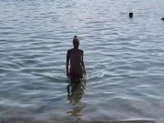 Naked Monika Fox swims in the sea and walks along the beach on a public beach 5/16